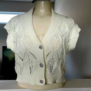 Beautiful Cream sweater with shiny diamond cluster buttons.